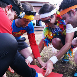 Birthday Amazing Race Team Doing Puzzle Tangram Dress Up
